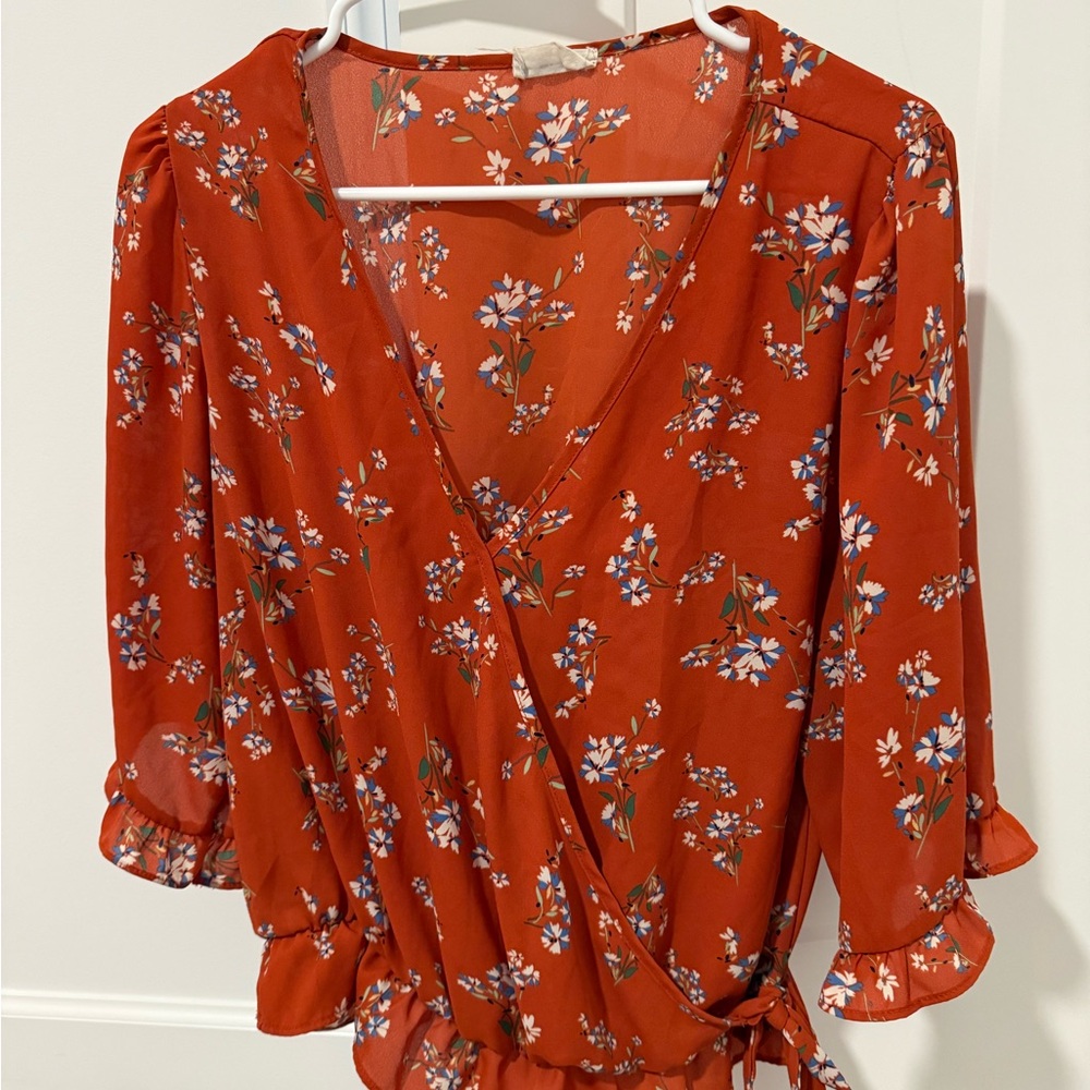 Sienna Sky Red Wrap Blouse with Ruffled Sleeves